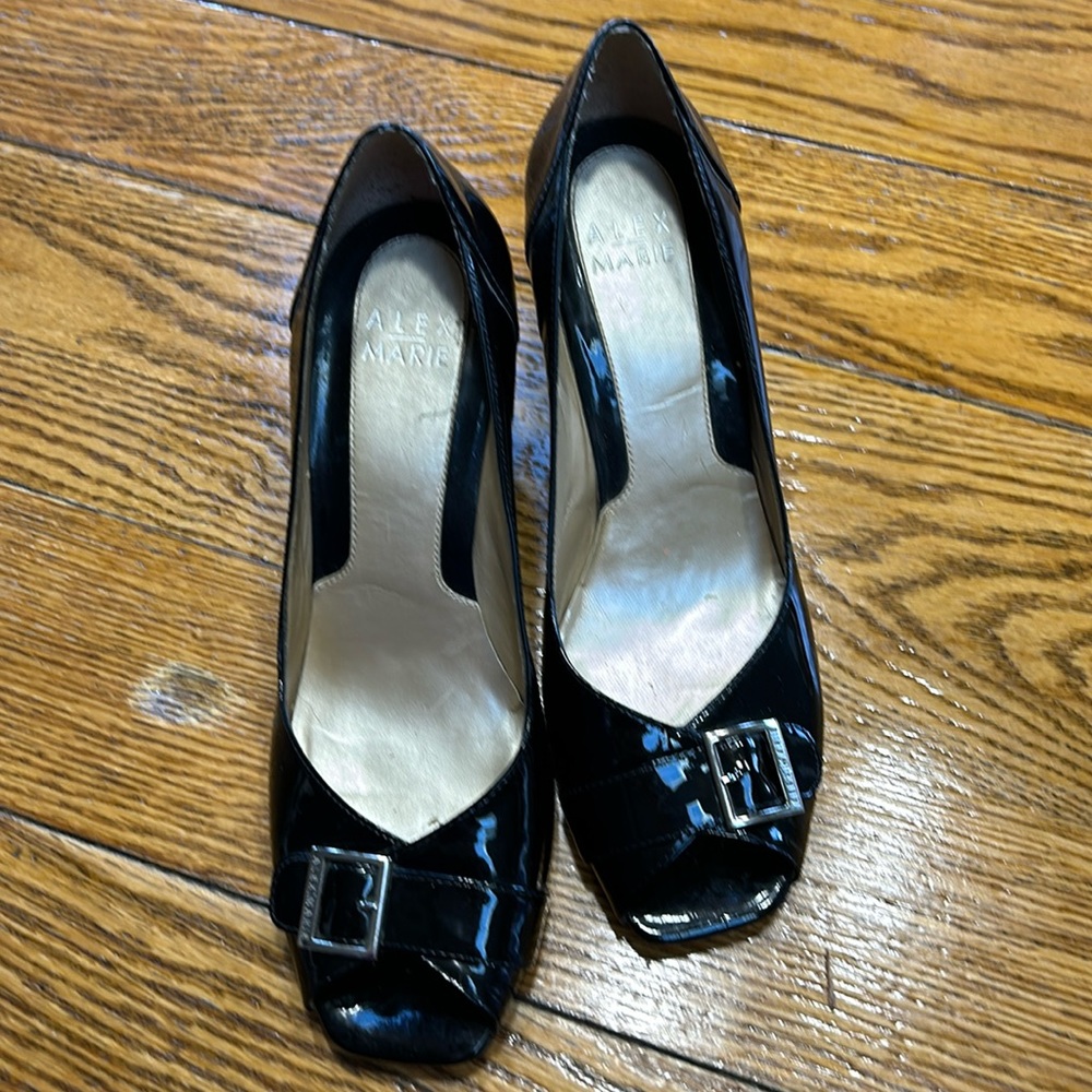 Alex Marie brand black patent peep toe wedge.  Size 8.